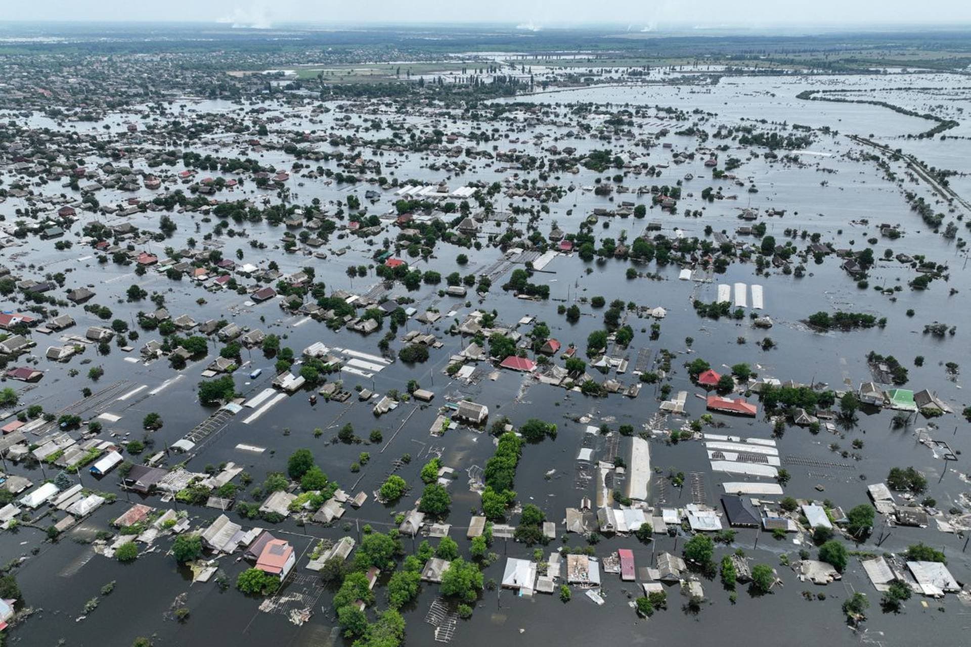Houses are seen underwater in the flooded town of Oleshky