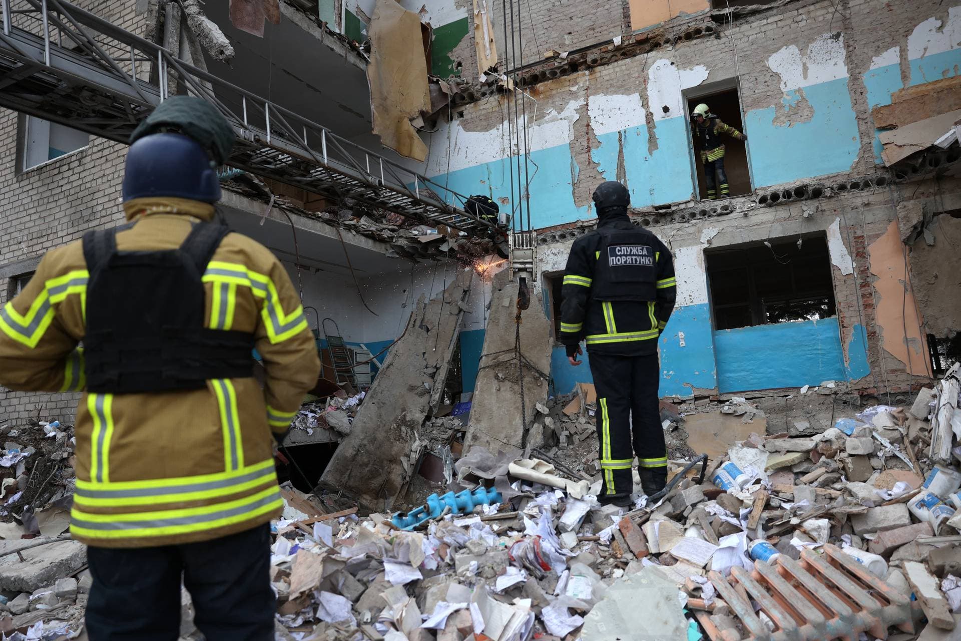 Rescuers found a third body in the rubble of a hospital in Selydove