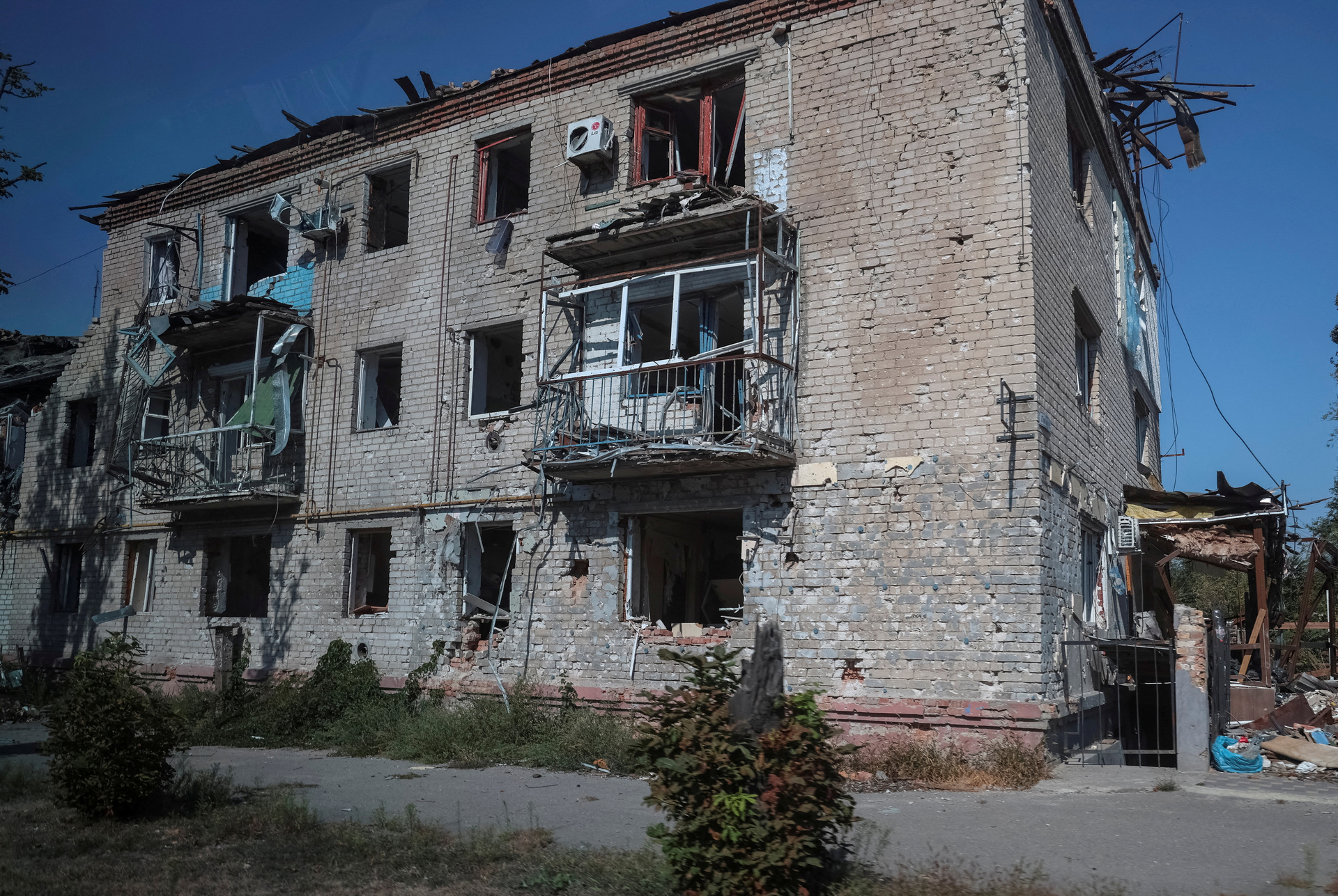 a residential building destroyed by a Russian military strike in Orikhiv