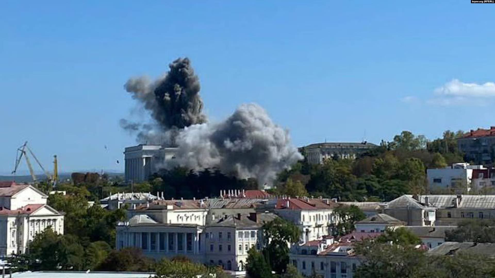 A satellite image shows smoke billowing from the Russian Black Sea Navy HQ after a missile strike in Sevastopol