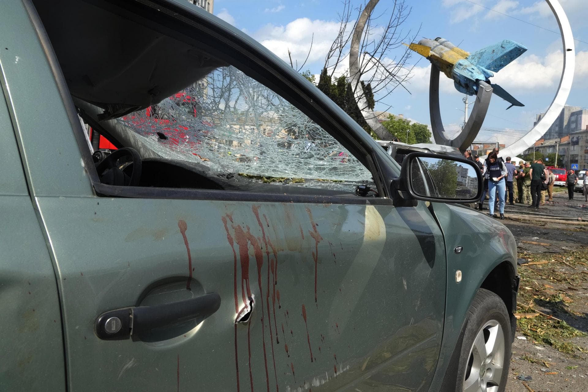 Blood stains are seen on a damaged car after a deadly Russian missile attack in Vinnytsia