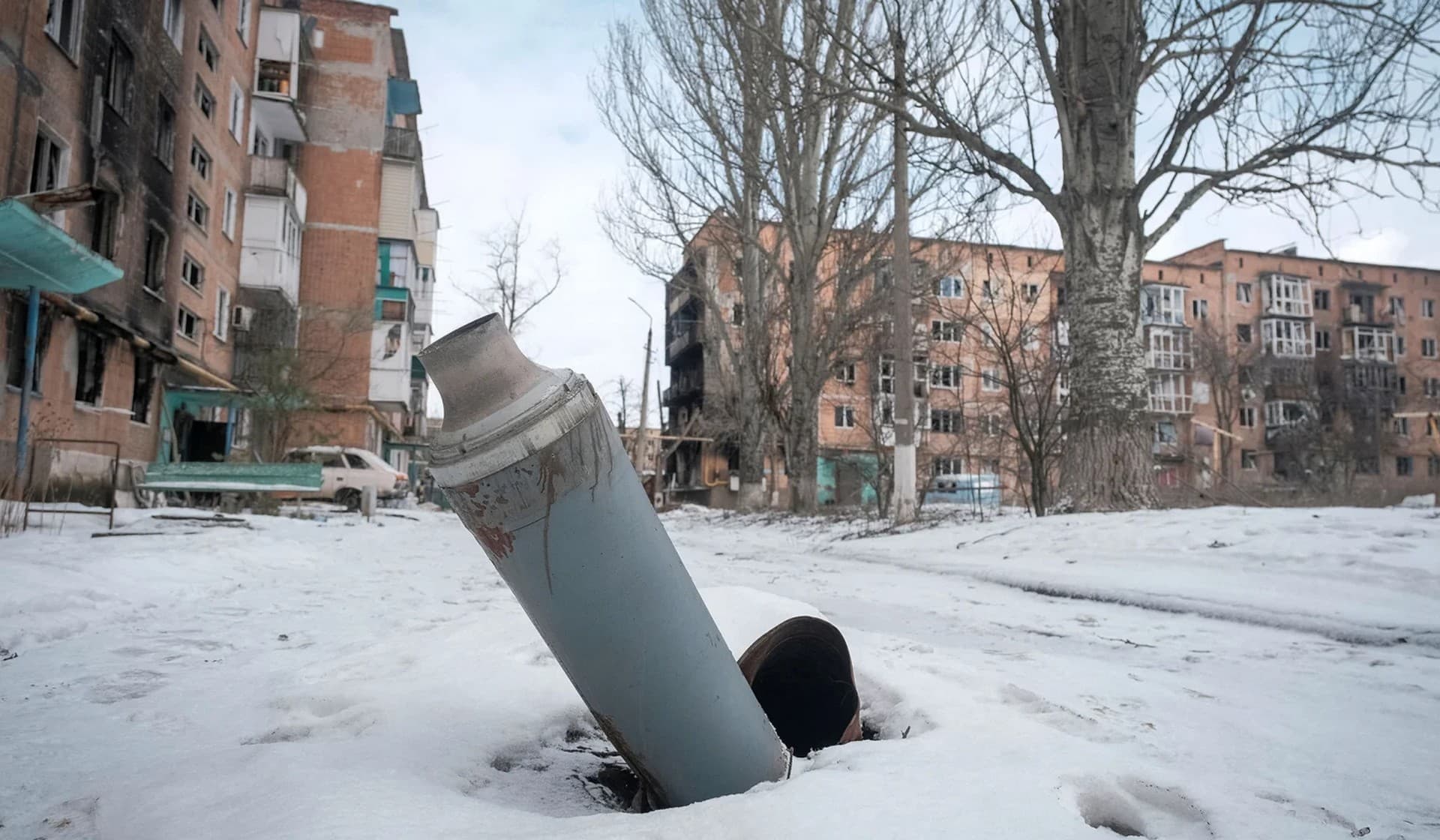 Part of a rocket near buildings damaged by a Russian military strike in the front line city of Vuhledar