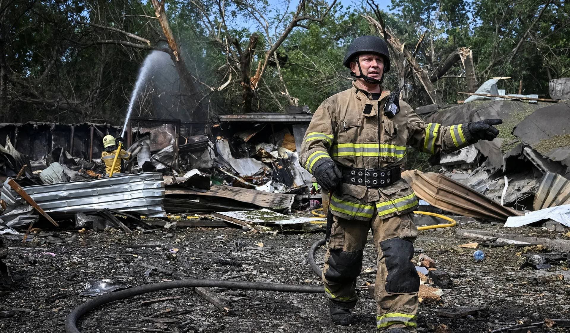 Rescuers work at a site of a Russian air strike in Zaporizhzhia