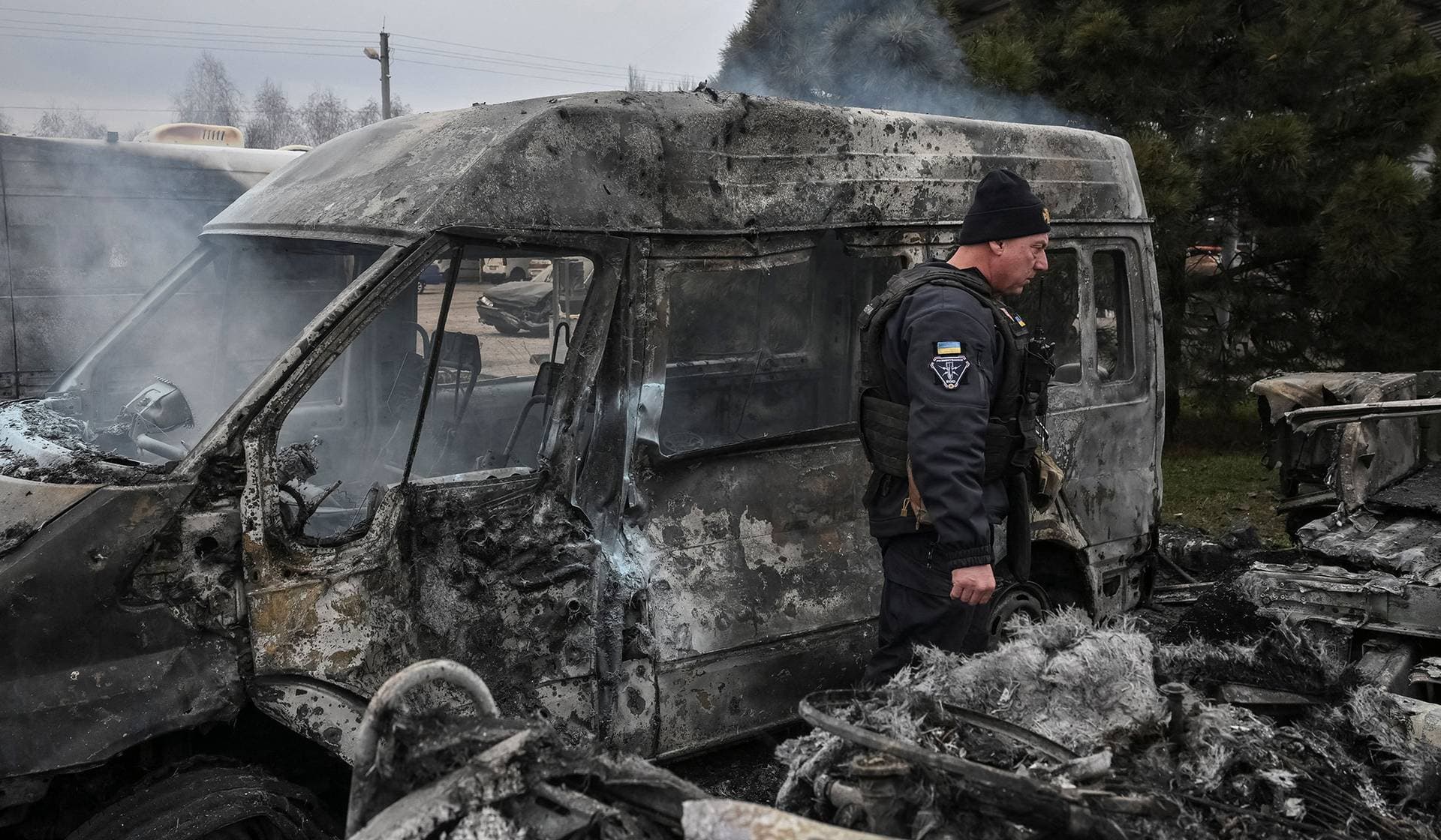 A police officer works at the site of the Russian drone strike in Zaporizhzhia