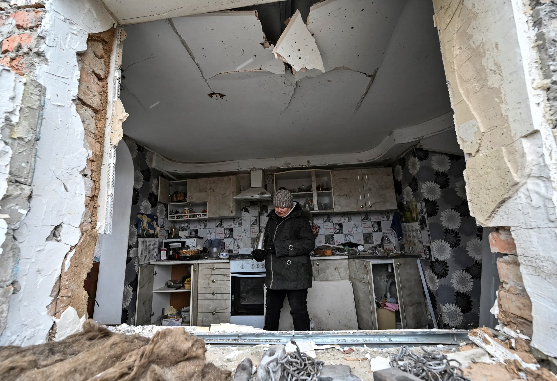 Local resident in her house heavily damaged by a Russian missile strike in the village of Kupriianivka