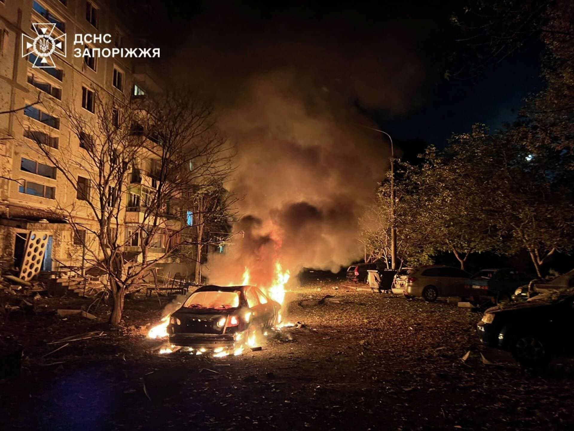 fire and smoke raises after a residential building was damaged during Russia's air strike in Zaporizhzhia