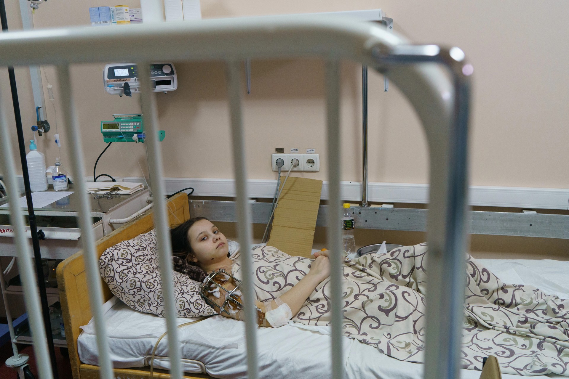 Masha Feshchenko, 15, rests in Zaporizhzhia's children's hospital after being severely wounded