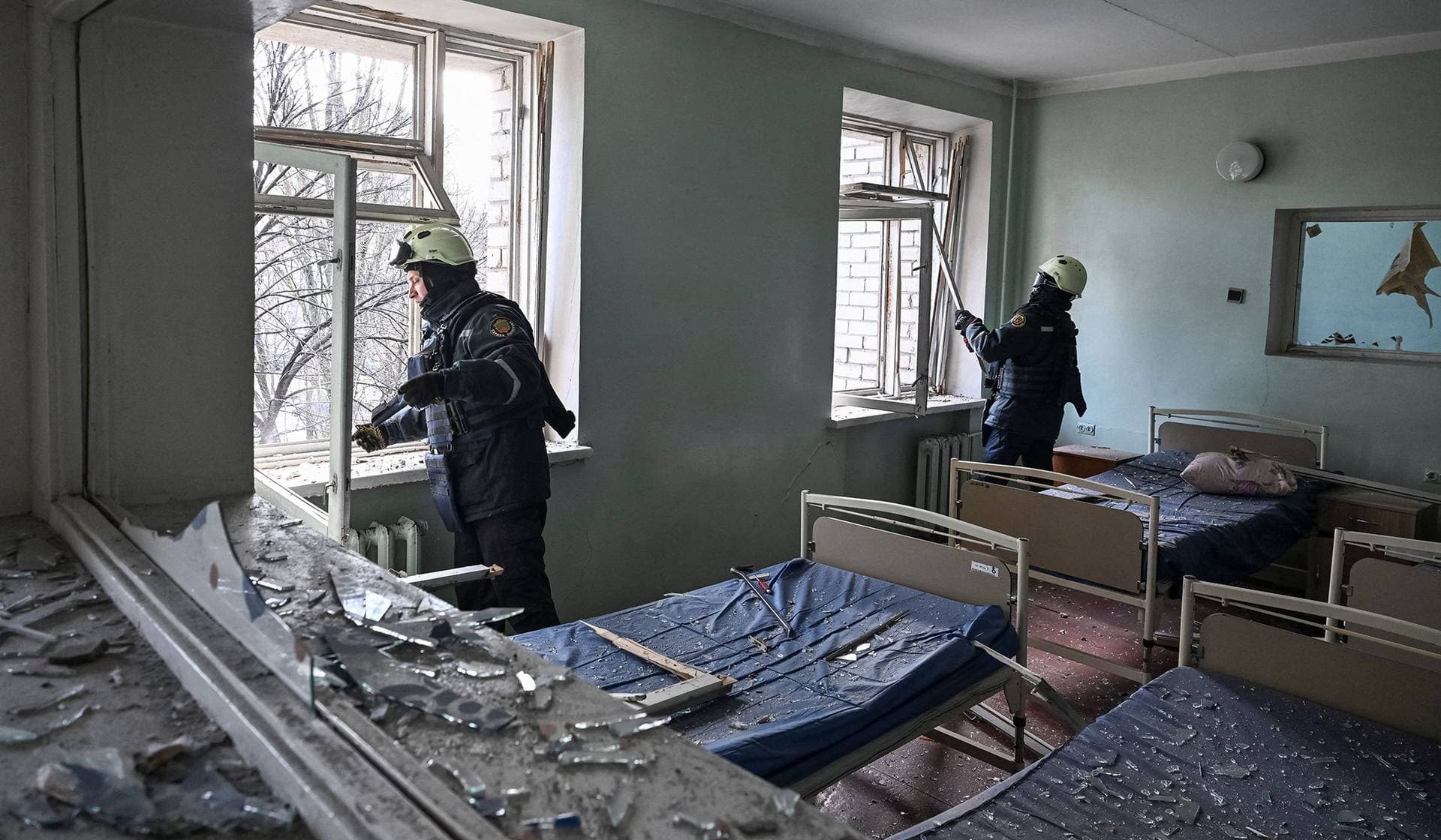 Rescuers work in the maternity hospital hit by a Russian drone strike in Zaporizhzhia